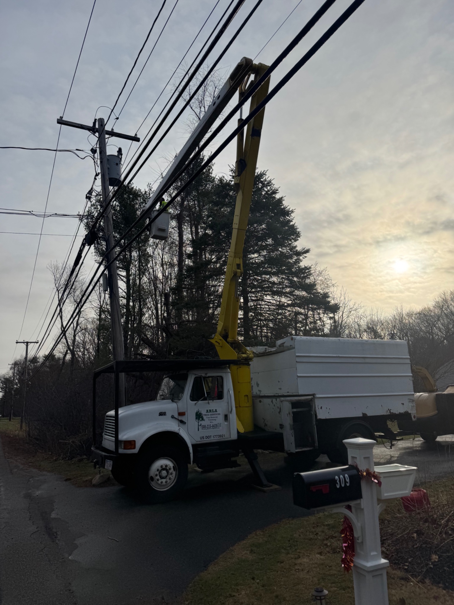 ARLA bucket truck working near power lines