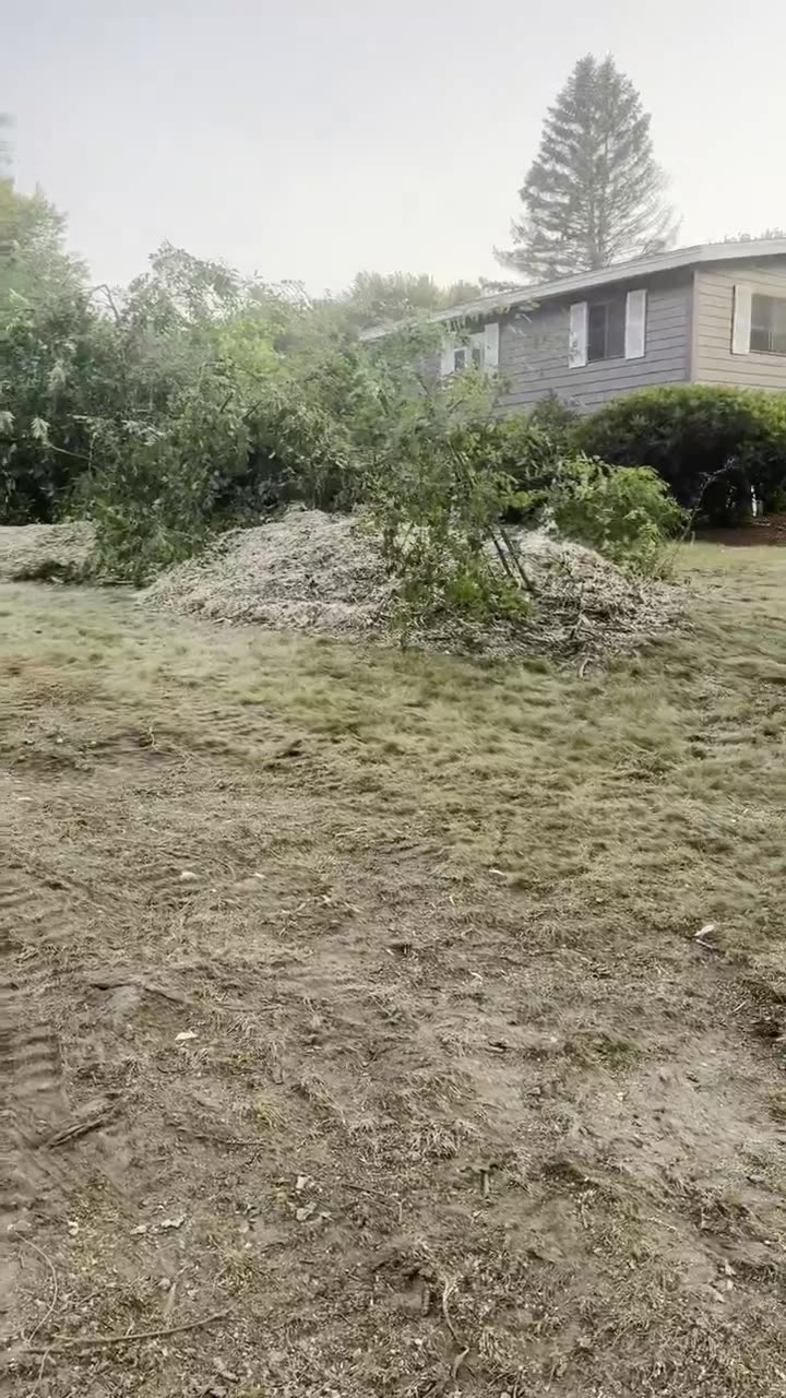 Brush piles and cleared residential property